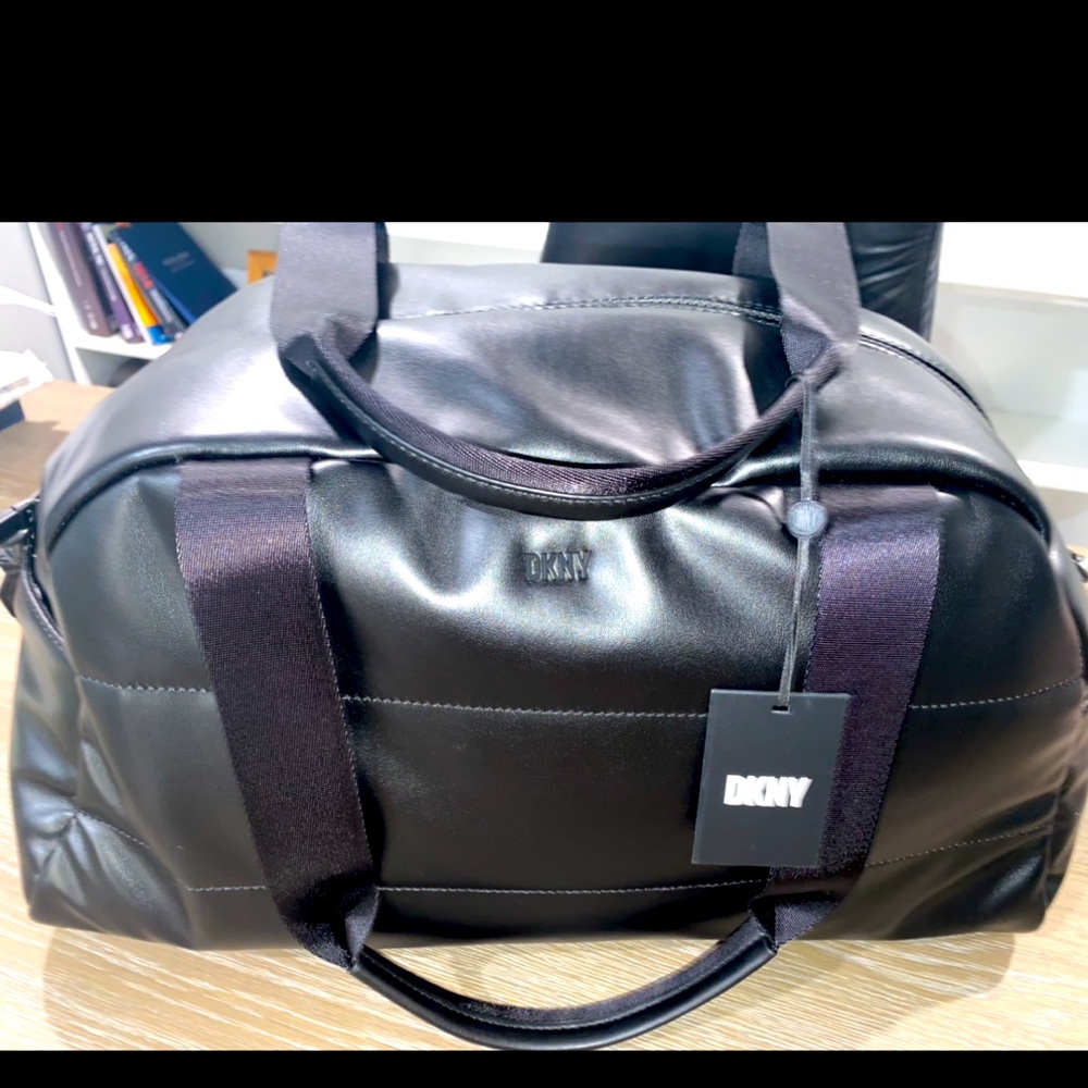 Gorgeous brand new DKNY gym bag! Always be in style w/this RARE all black finish